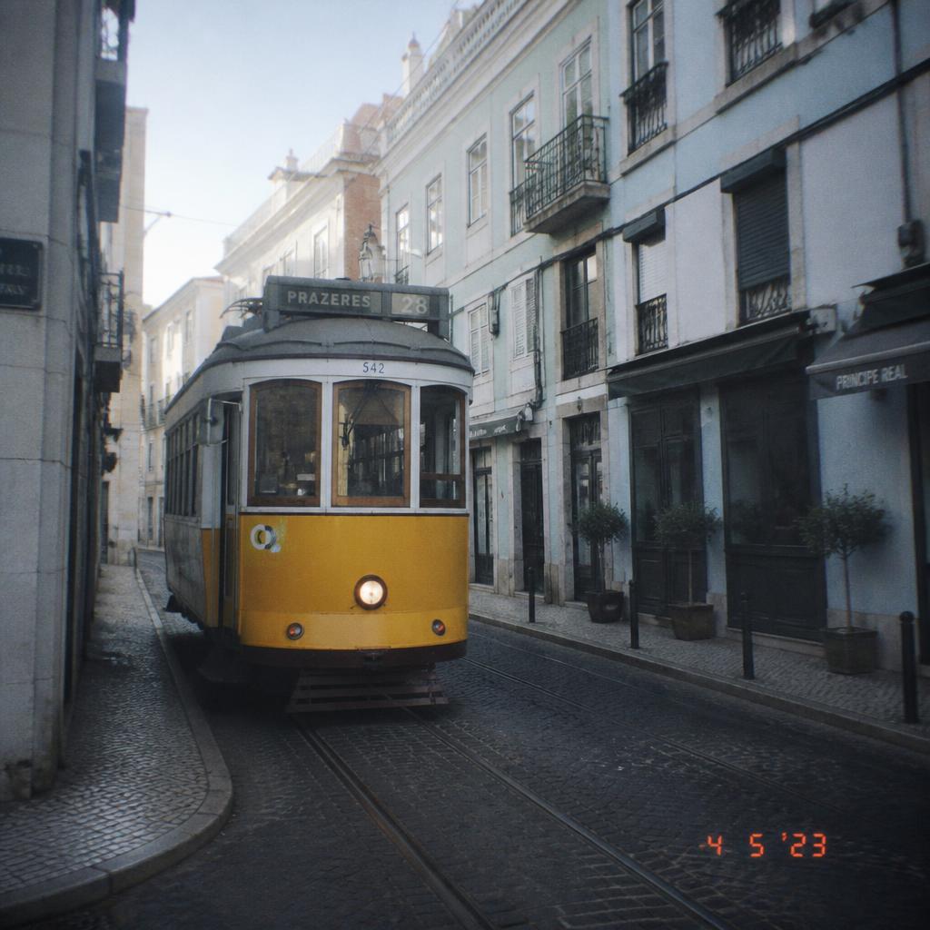 A yellow Lisbon tram on an empty cobbled street, shot on lomochrome disposable film with a subtle blue tint
